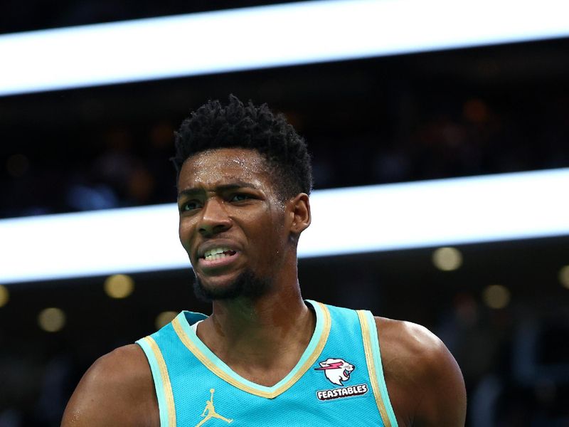 CHARLOTTE, NORTH CAROLINA - MARCH 29: Brandon Miller #24 of the Charlotte Hornets reacts during the first half of the game against the Golden State Warriors at Spectrum Center on March 29, 2024 in Charlotte, North Carolina. NOTE TO USER: User expressly acknowledges and agrees that, by downloading and or using this photograph, User is consenting to the terms and conditions of the Getty Images License Agreement. (Photo by Jared C. Tilton/Getty Images)