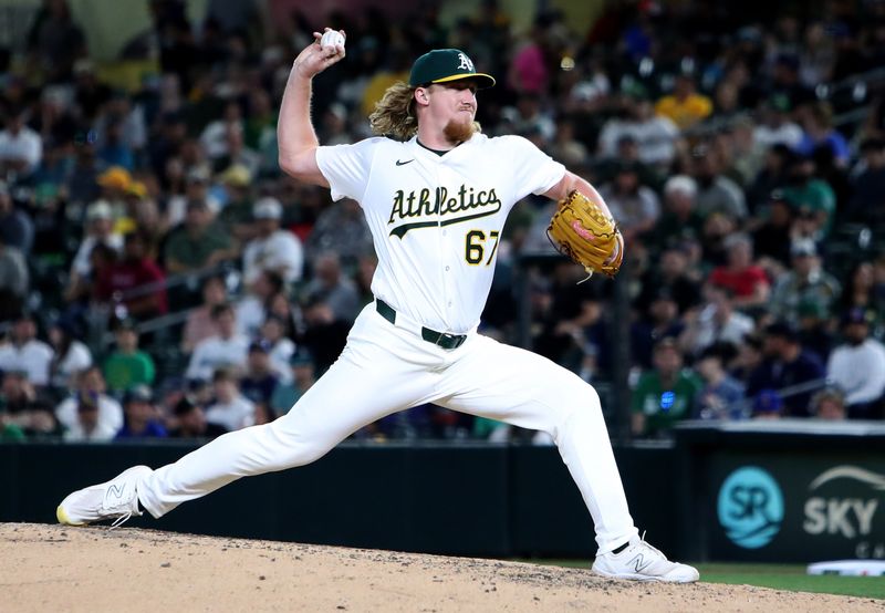 May 5, 2025; West Sacramento, California, USA; Athletics pitcher Grant Holman (67) throws against the Seattle Mariners during the seventh inning at Sutter Health Park. Mandatory Credit: Dennis Lee-Imagn Images