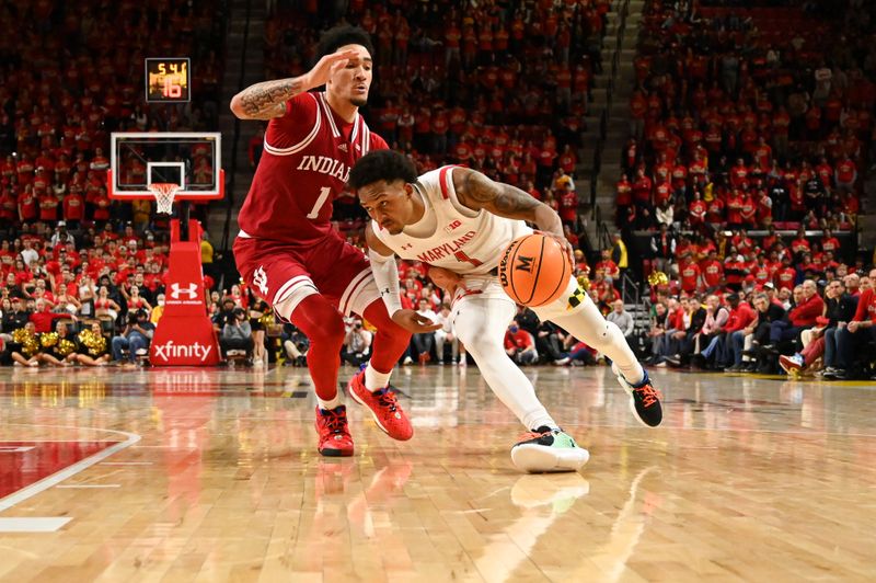 Jan 31, 2023; College Park, Maryland, USA;  Maryland Terrapins guard Jahmir Young (1)] dribbles by Indiana Hoosiers guard Jalen Hood-Schifino (1) to the basket during the second half at Xfinity Center. Mandatory Credit: Tommy Gilligan-USA TODAY Sports