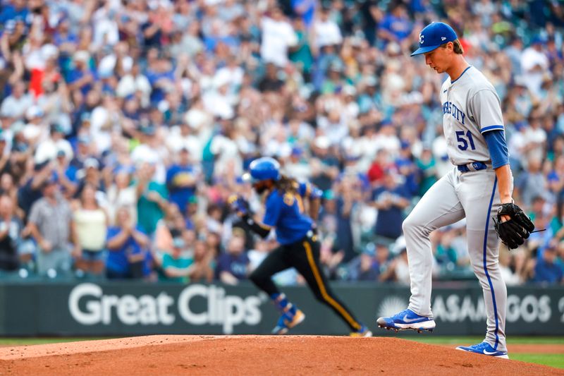 Aug 25, 2023; Seattle, Washington, USA; Kansas City Royals starting pitcher Brady Singer (51) walks around the mound after surrendering a solo-home run to Seattle Mariners shortstop J.P. Crawford (3, background) during the first inning at T-Mobile Park. Mandatory Credit: Joe Nicholson-USA TODAY Sports