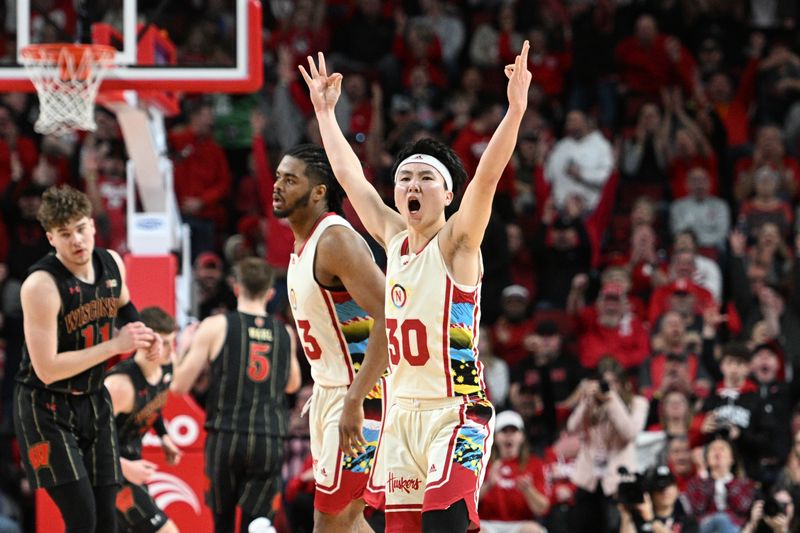 Feb 11, 2023; Lincoln, Nebraska, USA;  Nebraska Cornhuskers guard Keisei Tominaga (30) reacts after making a three point basket against the Wisconsin Badgers in the second half at Pinnacle Bank Arena. Mandatory Credit: Steven Branscombe-USA TODAY Sports