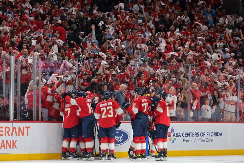 May 9, 2025; Sunrise, Florida, USA; Florida Panthers players celebrate after winning against the Toronto Maple Leafs during overtime in game three of the second round of the 2025 Stanley Cup Playoffs at Amerant Bank Arena. Mandatory Credit: Sam Navarro-Imagn Images