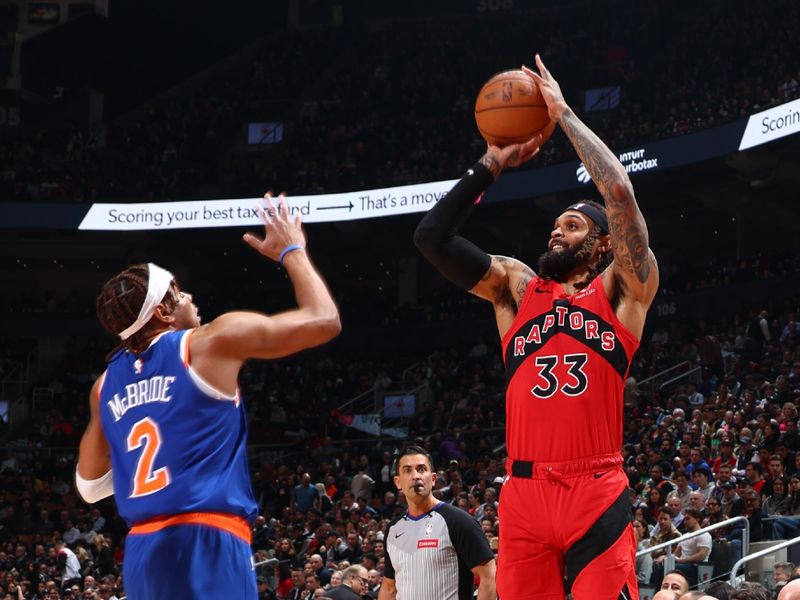 TORONTO, CANADA - MARCH 27: Gary Trent Jr. #33 of the Toronto Raptors shoots the ball during the game against the New York Knicks on March 27, 2024 at the Scotiabank Arena in Toronto, Ontario, Canada.  NOTE TO USER: User expressly acknowledges and agrees that, by downloading and or using this Photograph, user is consenting to the terms and conditions of the Getty Images License Agreement.  Mandatory Copyright Notice: Copyright 2024 NBAE (Photo by Vaughn Ridley/NBAE via Getty Images)