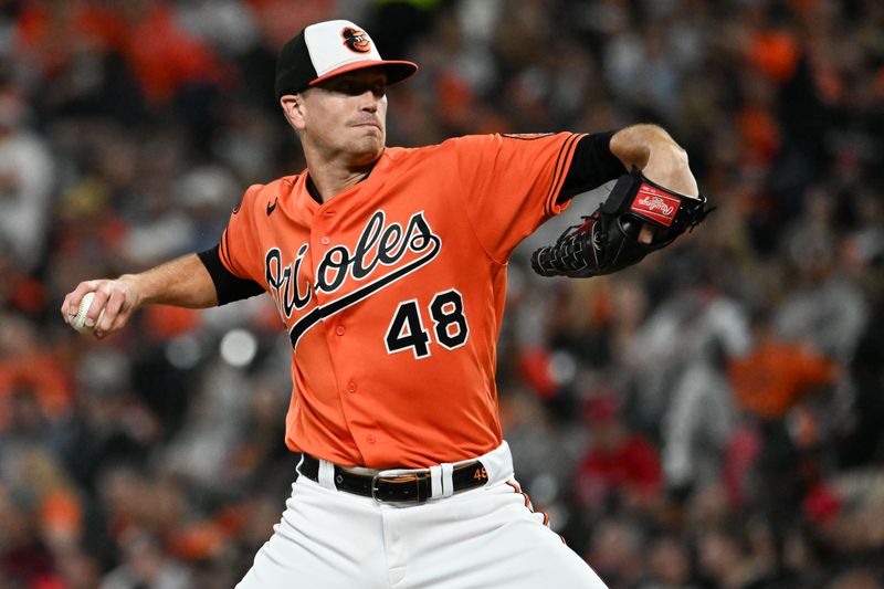 Sep 30, 2023; Baltimore, Maryland, USA;  Baltimore Orioles starting pitcher Kyle Gibson (48) throws a first inning pitch against the Boston Red Sox  at Oriole Park at Camden Yards. Mandatory Credit: Tommy Gilligan-USA TODAY Sports