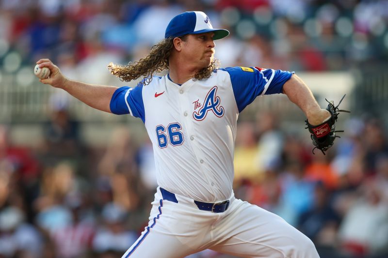 Aug 3, 2024; Atlanta, Georgia, USA; Atlanta Braves relief pitcher Grant Holmes (66) throws against the Miami Marlins in the first inning at Truist Park. Mandatory Credit: Brett Davis-USA TODAY Sports
