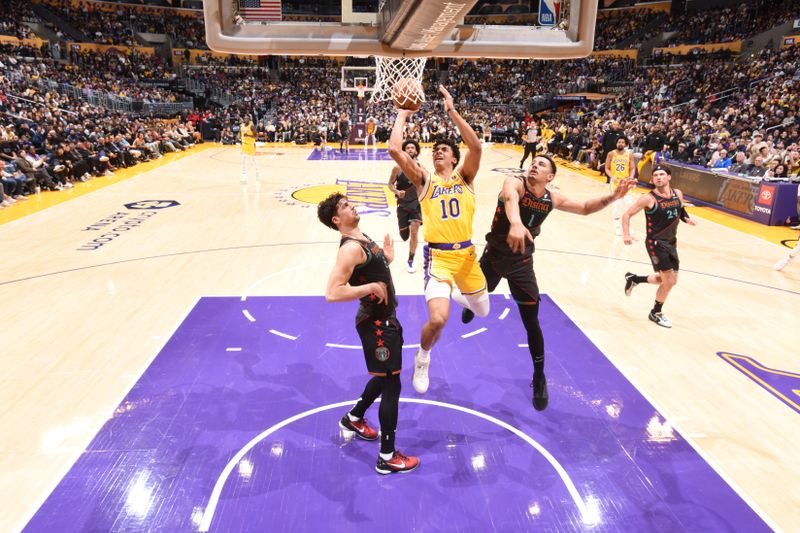 LOS ANGELES, CA - FEBRUARY 29: Max Christie #10 of the Los Angeles Lakers drives to the basket during the game against the Washington Wizards on February 29, 2024 at Crypto.Com Arena in Los Angeles, California. NOTE TO USER: User expressly acknowledges and agrees that, by downloading and/or using this Photograph, user is consenting to the terms and conditions of the Getty Images License Agreement. Mandatory Copyright Notice: Copyright 2024 NBAE (Photo by Andrew D. Bernstein/NBAE via Getty Images)