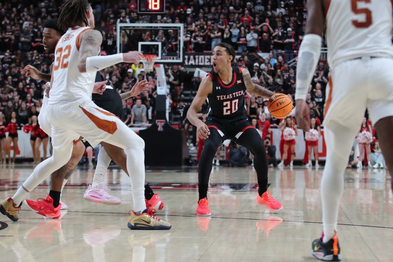 Feb 13, 2023; Lubbock, Texas, USA;  Texas Tech Red Raiders forward Jaylon Tyson (20) dribbles the ball against Texas Longhorns forward Christian Bishop (32) in the second half at United Supermarkets Arena. Mandatory Credit: Michael C. Johnson-USA TODAY Sports