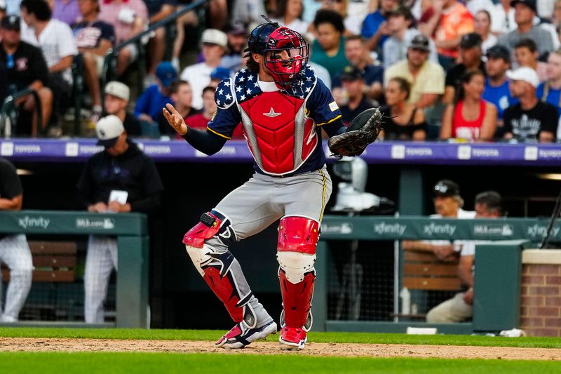 Jul 4, 2024; Denver, Colorado, USA; Milwaukee Brewers catcher Eric Haase (13) wears 4th of July colors against the Colorado Rockies during the seventh inning at Coors Field. Mandatory Credit: Troy Babbitt-USA TODAY Sports

 