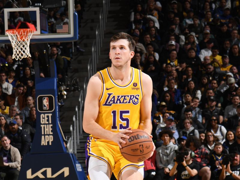 SAN FRANCISCO, CA - FEBRUARY 22:  Austin Reaves #15 of the Los Angeles Lakers handles the ball during the game  on February 22, 2024 at Chase Center in San Francisco, California. NOTE TO USER: User expressly acknowledges and agrees that, by downloading and or using this photograph, user is consenting to the terms and conditions of Getty Images License Agreement. Mandatory Copyright Notice: Copyright 2024 NBAE (Photo by Noah Graham/NBAE via Getty Images)