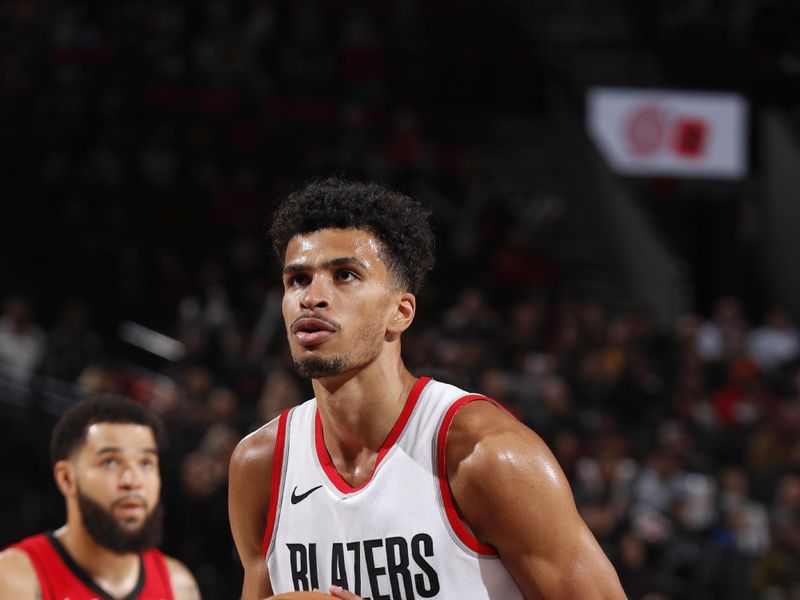 PORTLAND, OR - MARCH 8:  Toumani Camara #33 of the Portland Trail Blazers shoots a free throw during the game on March 8, 2024 at the Moda Center Arena in Portland, Oregon. NOTE TO USER: User expressly acknowledges and agrees that, by downloading and or using this photograph, user is consenting to the terms and conditions of the Getty Images License Agreement. Mandatory Copyright Notice: Copyright 2024 NBAE (Photo by Cameron Browne/NBAE via Getty Images)