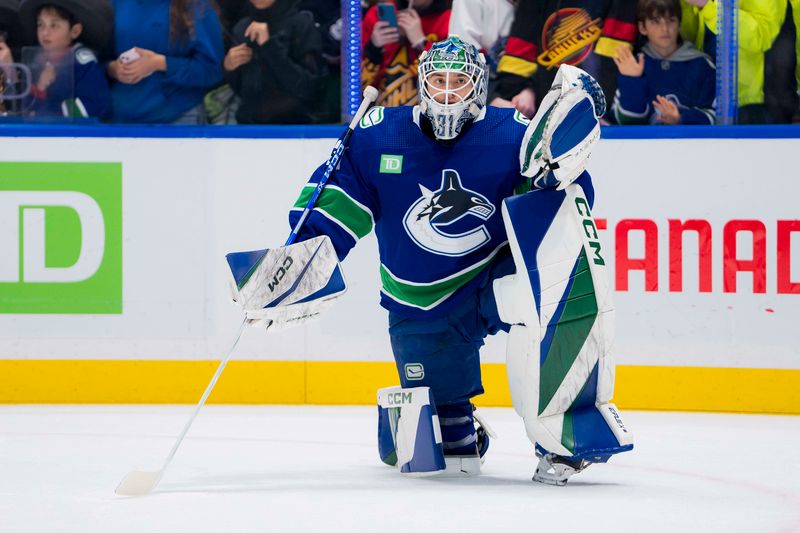 Mar 13, 2024; Vancouver, British Columbia, CAN; Vancouver Canucks goalie Arturs Silvos (31) rests during warm up prior to a game against the Colorado Avalanche at Rogers Arena. Mandatory Credit: Bob Frid-USA TODAY Sports