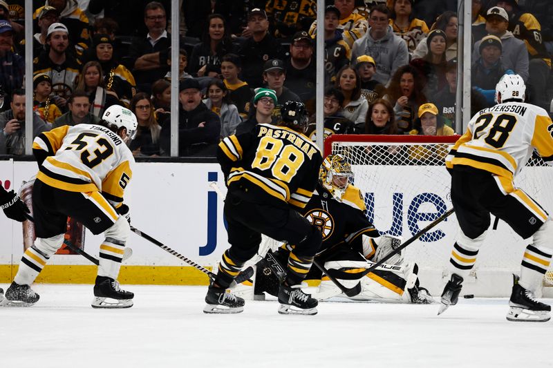 Nov 29, 2024; Boston, Massachusetts, USA; Pittsburgh Penguins center Philip Tomasino (53) scores the winning goal on Boston Bruins goaltender Jeremy Swayman (1) during the third period at TD Garden. Mandatory Credit: Winslow Townson-Imagn Images