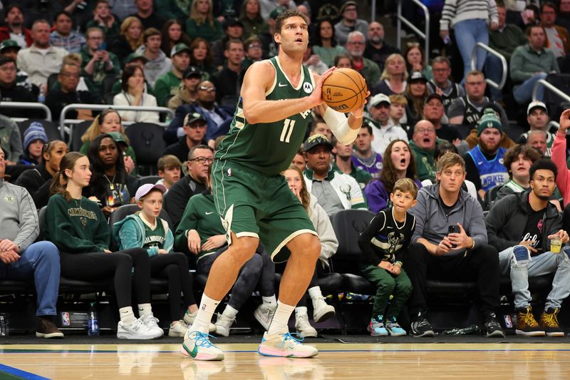 MILWAUKEE, WISCONSIN - NOVEMBER 26: Brook Lopez #11 of the Milwaukee Bucks takes a three point shot during the first half of a game against the Portland Trail Blazers at Fiserv Forum on November 26, 2023 in Milwaukee, Wisconsin. NOTE TO USER: User expressly acknowledges and agrees that, by downloading and or using this photograph, User is consenting to the terms and conditions of the Getty Images License Agreement. (Photo by Stacy Revere/Getty Images)