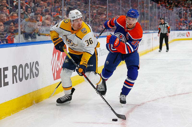 Jan 27, 2024; Edmonton, Alberta, CAN; Nashville Predators forward Cole Smith (36) controls the puck in front Edmonton Oilers forward Connor McDavid (97) during the second period at Rogers Place. Mandatory Credit: Perry Nelson-USA TODAY Sports