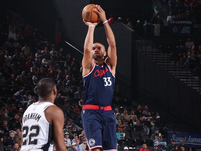 INGLEWOOD, CA - NOVEMBER 4: Nicolas Batum #33 of the LA Clippers shoots the ball during the game against the San Antonio Spurs on November 4, 2024 at Intuit Dome in Los Angeles, California. NOTE TO USER: User expressly acknowledges and agrees that, by downloading and/or using this Photograph, user is consenting to the terms and conditions of the Getty Images License Agreement. Mandatory Copyright Notice: Copyright 2024 NBAE (Photo by Nathaniel S. Butler/NBAE via Getty Images)