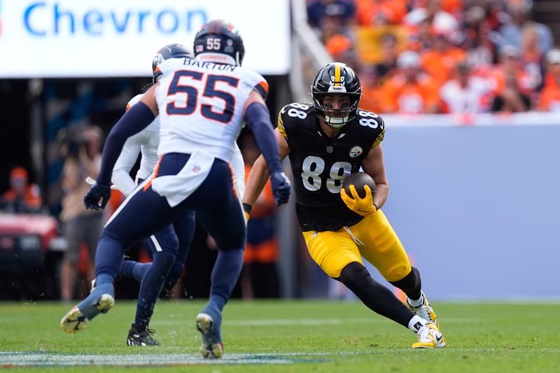 Pittsburgh Steelers tight end Pat Freiermuth (88) runs during the first half of an NFL football game against the Denver Broncos, Sunday, Sept. 15, 2024, in Denver. (AP Photo/David Zalubowski)