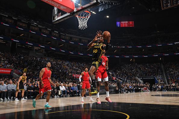 SAN FRANCISCO, CA - DECEMBER 23: Jonathan Kuminga #00 of the Golden State Warriors shoots the ball during the game against the Portland Trail Blazers on December 23, 2023 at Chase Center in San Francisco, California. NOTE TO USER: User expressly acknowledges and agrees that, by downloading and or using this photograph, user is consenting to the terms and conditions of Getty Images License Agreement. Mandatory Copyright Notice: Copyright 2023 NBAE (Photo by Noah Graham/NBAE via Getty Images)