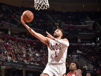 CLEVELAND, OH - NOVEMBER 26: Max Strus #1 of the Cleveland Cavaliers drives to the basket during the game against the Toronto Raptors on November 26, 2023 at Rocket Mortgage FieldHouse in Cleveland, Ohio. NOTE TO USER: User expressly acknowledges and agrees that, by downloading and/or using this Photograph, user is consenting to the terms and conditions of the Getty Images License Agreement. Mandatory Copyright Notice: Copyright 2023 NBAE (Photo by David Liam Kyle/NBAE via Getty Images)