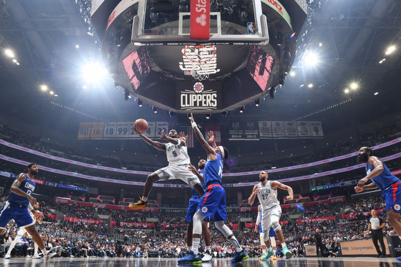 LOS ANGELES, CA - FEBRUARY 12:  Anthony Edwards #5 of the Minnesota Timberwolves goes to the basket during the game on February 12, 2024 at Crypto.Com Arena in Los Angeles, California. NOTE TO USER: User expressly acknowledges and agrees that, by downloading and/or using this Photograph, user is consenting to the terms and conditions of the Getty Images License Agreement. Mandatory Copyright Notice: Copyright 2024 NBAE (Photo by Adam Pantozzi/NBAE via Getty Images)