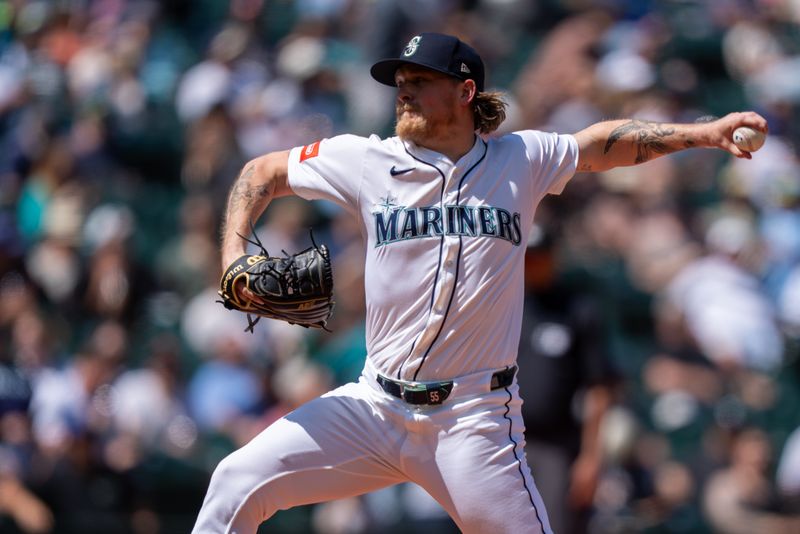 Jun 5, 2025; Seattle, Washington, USA;  Reliever Gabe Speier (55)delivers a pitch during the eighth inning against the Baltimore Orioles at T-Mobile Park. Mandatory Credit: Stephen Brashear-Imagn Images