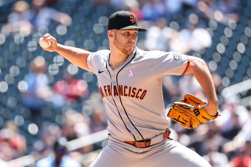 May 11, 2025; Minneapolis, Minnesota, USA; San Francisco Giants starting pitcher Landen Roupp (65) delivers a pitch against the Minnesota Twins during the first inning at Target Field. Mandatory Credit: Matt Krohn-Imagn Images