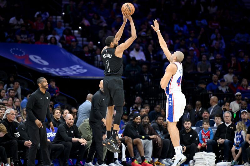 PHILADELPHIA, PENNSYLVANIA - APRIL 14: Mikal Bridges #1 of the Brooklyn Nets shoots the ball in the first quarter against Nicolas Batum #40 of the Philadelphia 76ers at the Wells Fargo Center on April 14, 2024 in Philadelphia, Pennsylvania.  NOTE TO USER: User expressly acknowledges and agrees that, by downloading and or using this photograph, User is consenting to the terms and conditions of the Getty Images License Agreement. (Photo by Greg Fiume/Getty Images)