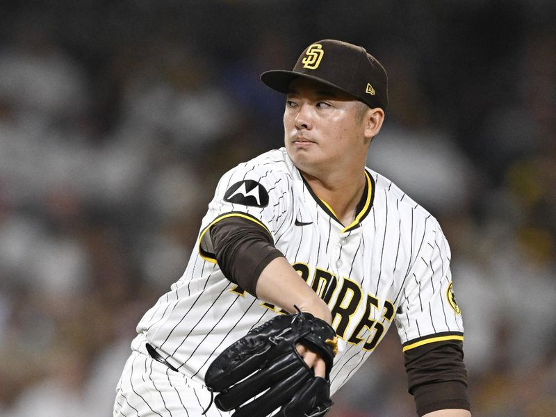 Sep 10, 2025; San Diego, California, USA; San Diego Padres relief pitcher Yuki Matsui (1) delivers during the ninth inning against the Cincinnati Reds at Petco Park. Mandatory Credit: Denis Poroy-Imagn Images