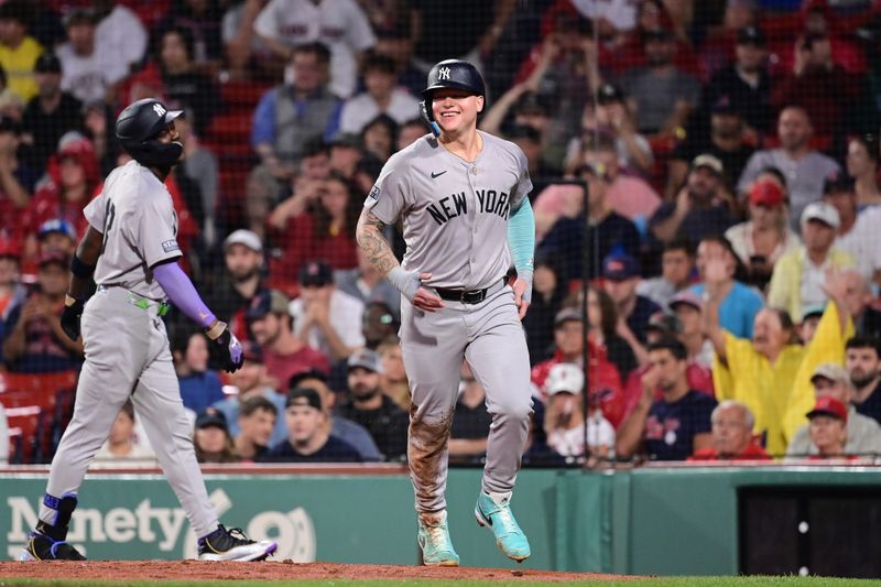 Jul 28, 2024; Boston, Massachusetts, USA; New York Yankees right fielder Alex Verdugo (24) reacts to to scoring a run on a hit by catcher Austin Wells (28) (not pictured) during the seventh inning against the Boston Red Sox at Fenway Park. Mandatory Credit: Eric Canha-USA TODAY Sports