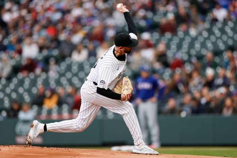 May 10, 2024; Denver, Colorado, USA; Colorado Rockies starting pitcher Austin Gomber (26) pitches in the first inning against the Texas Rangers at Coors Field. Mandatory Credit: Isaiah J. Downing-USA TODAY Sports