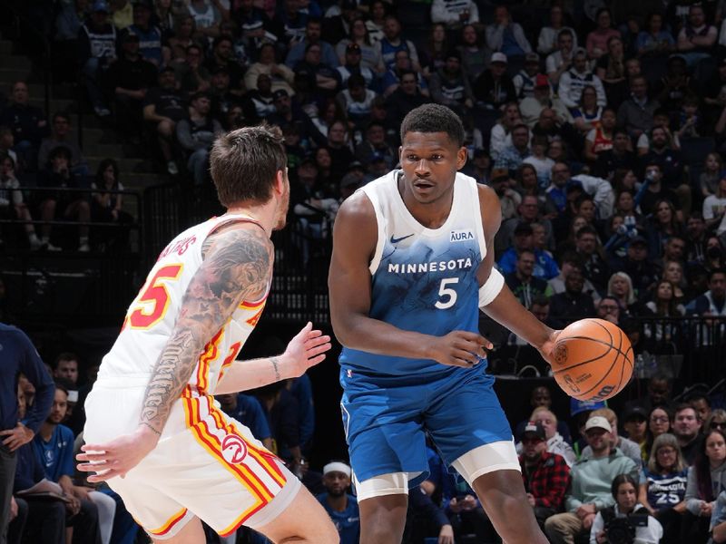 MINNEAPOLIS, MN -  APRIL 12: Anthony Edwards #5 of the Minnesota Timberwolves handles the ball during the game against the Atlanta Hawks on April 12, 2024 at Target Center in Minneapolis, Minnesota. NOTE TO USER: User expressly acknowledges and agrees that, by downloading and or using this Photograph, user is consenting to the terms and conditions of the Getty Images License Agreement. Mandatory Copyright Notice: Copyright 2024 NBAE (Photo by Jordan Johnson/NBAE via Getty Images)