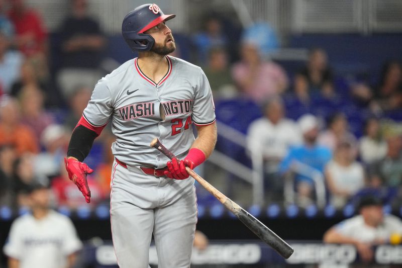 Sep 3, 2024; Miami, Florida, USA;  Washington Nationals first baseman Joey Gallo (24) watches his three-run home run during the fourth inning against the Miami Marlins at loanDepot Park. Mandatory Credit: Jim Rassol-Imagn Images.