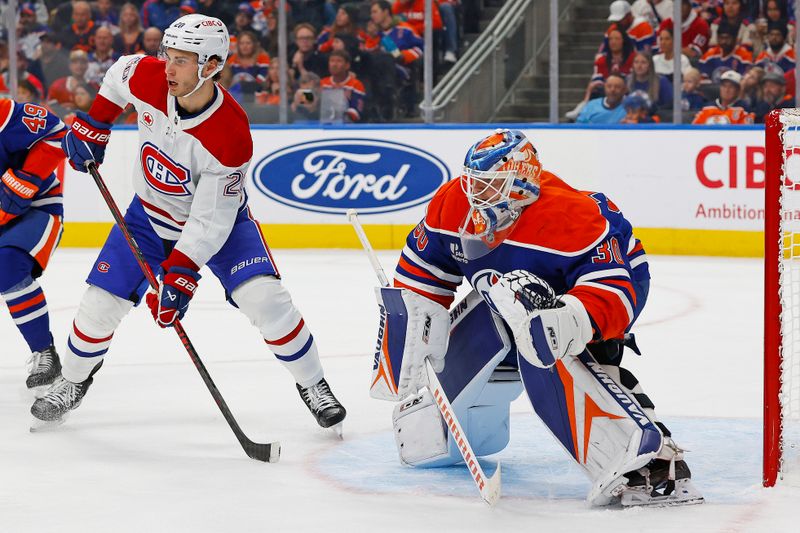 Oct 23, 2025; Edmonton, Alberta, CAN; Montreal Canadiens forward Juraj Slafkovsky (20) looks for a pass in front of Edmonton Oilers goaltender Calvin Pickard (30) during the second period at Rogers Place. Mandatory Credit: Perry Nelson-Imagn Images