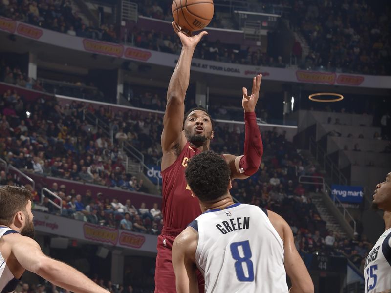 CLEVELAND, OH - FEBRUARY 27: Donovan Mitchell #45 of the Cleveland Cavaliers shoots the ball during the game against the Dallas Mavericks on February 27, 2024 at Rocket Mortgage FieldHouse in Cleveland, Ohio. NOTE TO USER: User expressly acknowledges and agrees that, by downloading and/or using this Photograph, user is consenting to the terms and conditions of the Getty Images License Agreement. Mandatory Copyright Notice: Copyright 2024 NBAE (Photo by David Liam Kyle/NBAE via Getty Images)