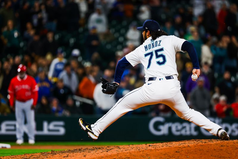 Apr 29, 2025; Seattle, Washington, USA; Seattle Mariners pitcher Andrés Muñoz (75) throws against the Los Angeles Angels during the ninth inning at T-Mobile Park. Mandatory Credit: Joe Nicholson-Imagn Images