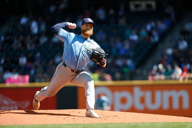 Aug 28, 2024; Seattle, Washington, USA; Tampa Bay Rays starting pitcher Drew Rasmussen (57) throws against the Seattle Mariners during the first inning at T-Mobile Park. Mandatory Credit: Joe Nicholson-USA TODAY Sports