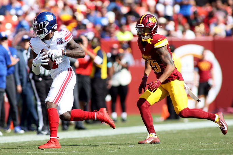 New York Giants wide receiver Malik Nabers (1) makes a catch during an NFL football game against the Washington Commanders, Sunday, September 15, 2024 in Landover. (AP Photo/Daniel Kucin Jr.)