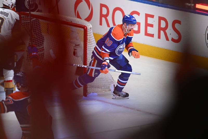 May 10, 2025; Edmonton, Alberta, CAN;  Edmonton Oilers right winger Corey Perry (90) celebrates a goal on Vegas Golden Knights goalie Adin Hill (33) during the first period in game three of the second round of the 2025 Stanley Cup Playoffs at Rogers Place. Mandatory Credit: Walter Tychnowicz-Imagn Images