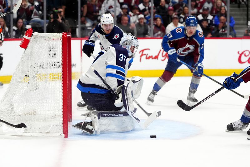 Apr 28, 2024; Denver, Colorado, USA; Winnipeg Jets goaltender Connor Hellebuyck (37) during the second period against the Colorado Avalanche in game four of the first round of the 2024 Stanley Cup Playoffs at Ball Arena. Mandatory Credit: Ron Chenoy-USA TODAY Sports