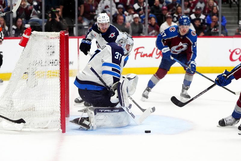 Apr 28, 2024; Denver, Colorado, USA; Winnipeg Jets goaltender Connor Hellebuyck (37) during the second period against the Colorado Avalanche in game four of the first round of the 2024 Stanley Cup Playoffs at Ball Arena. Mandatory Credit: Ron Chenoy-USA TODAY Sports