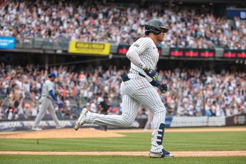 Aug 4, 2024; Bronx, New York, USA; New York Yankees right fielder Juan Soto (22) runs the bases after hitting a solo home run during the seventh inning against Toronto Blue Jays relief pitcher Genesis Cabrera (92) at Yankee Stadium. Mandatory Credit: Vincent Carchietta-USA TODAY Sports