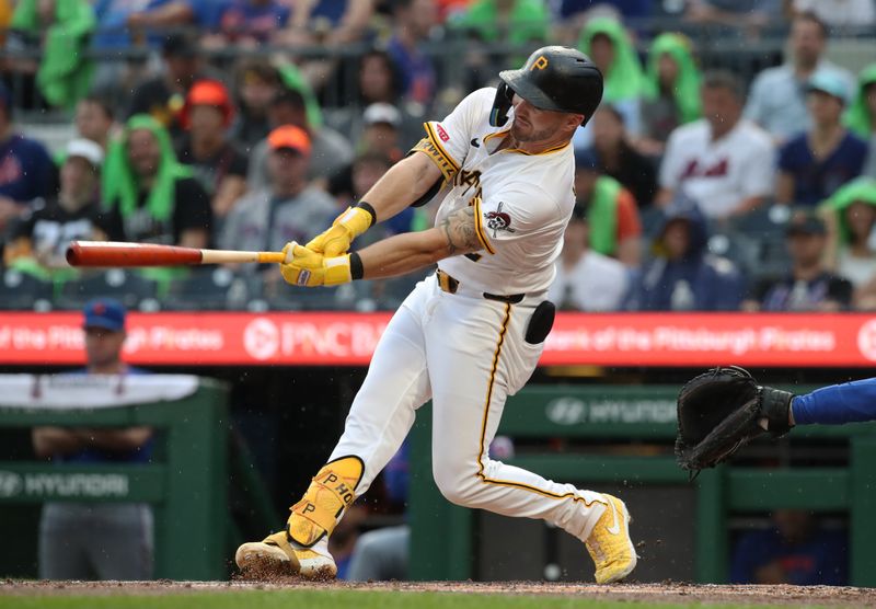 Jun 28, 2025; Pittsburgh, Pennsylvania, USA;  Pittsburgh Pirates first baseman Spencer Horwitz (2) hits a single against the New York Mets during the second inning at PNC Park. Mandatory Credit: Charles LeClaire-Imagn Images