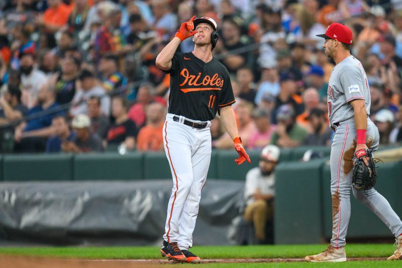 Jun 28, 2023; Baltimore, Maryland, USA; Baltimore Orioles third baseman Jordan Westburg (11) reacts after hitting a single during the first inning against the Cincinnati Reds at Oriole Park at Camden Yards. Mandatory Credit: Reggie Hildred-USA TODAY Sports