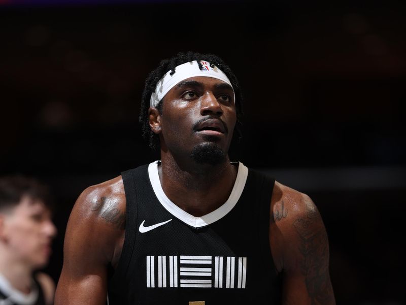 MEMPHIS, TN - MARCH 8: Vince Williams Jr. #5 of the Memphis Grizzlies shoots a free throw during the game against the Atlanta Hawks on March 8, 2024 at FedExForum in Memphis, Tennessee. NOTE TO USER: User expressly acknowledges and agrees that, by downloading and or using this photograph, User is consenting to the terms and conditions of the Getty Images License Agreement. Mandatory Copyright Notice: Copyright 2024 NBAE (Photo by Joe Murphy/NBAE via Getty Images)