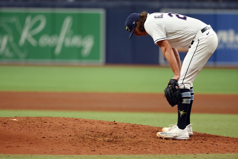 Oct 3, 2023; St. Petersburg, Florida, USA; Tampa Bay Rays starting pitcher Tyler Glasgow (20) reacts against the Texas Rangers in the fifth inning during game one of the Wildcard series for the 2023 MLB playoffs at Tropicana Field. Mandatory Credit: Kim Klement Neitzel-USA TODAY Sports