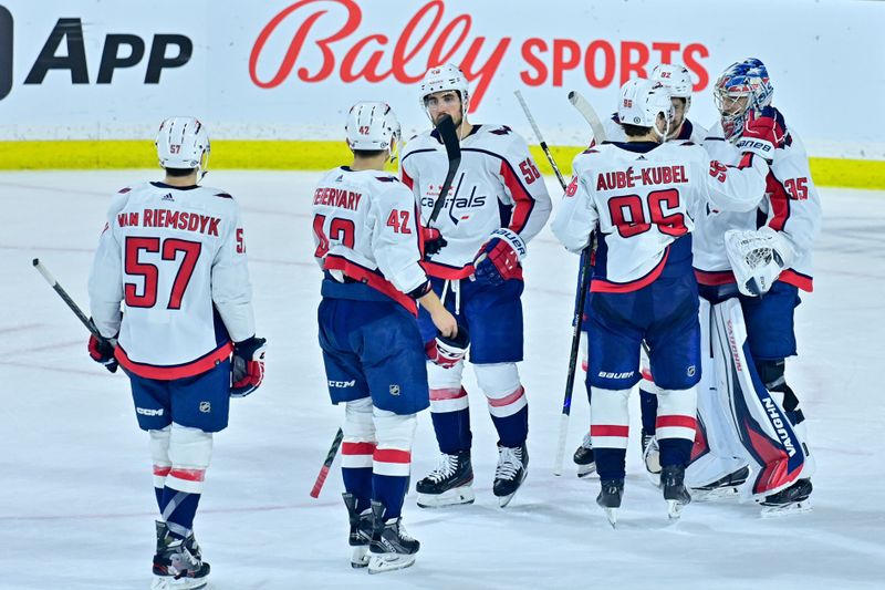 Jan 19, 2023; Tempe, Arizona, USA; Washington Capitals goaltender Darcy Kuemper (35) celebrates with teammates after beating the Arizona Coyotes at Mullett Arena. Mandatory Credit: Matt Kartozian-USA TODAY Sports