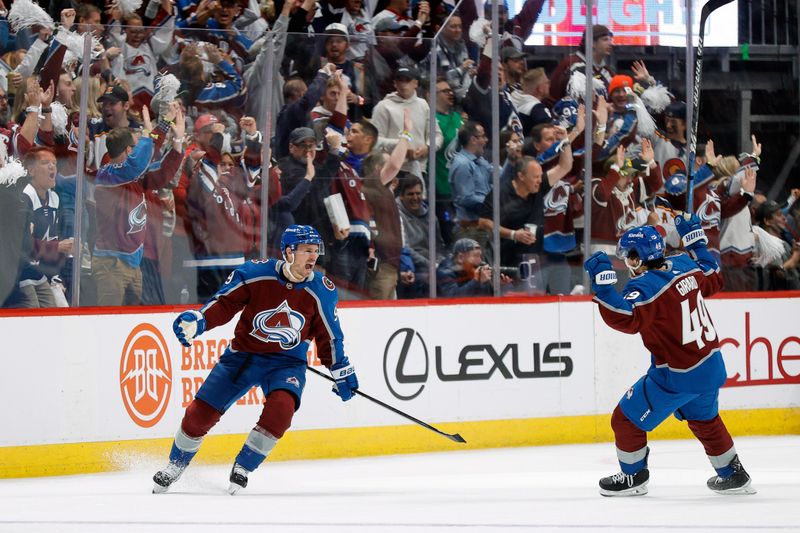 Apr 26, 2024; Denver, Colorado, USA; Colorado Avalanche left wing Zach Parise (9) celebrates his goal with defenseman Samuel Girard (49) in the first period against the Winnipeg Jets in game three of the first round of the 2024 Stanley Cup Playoffs at Ball Arena. Mandatory Credit: Isaiah J. Downing-USA TODAY Sports