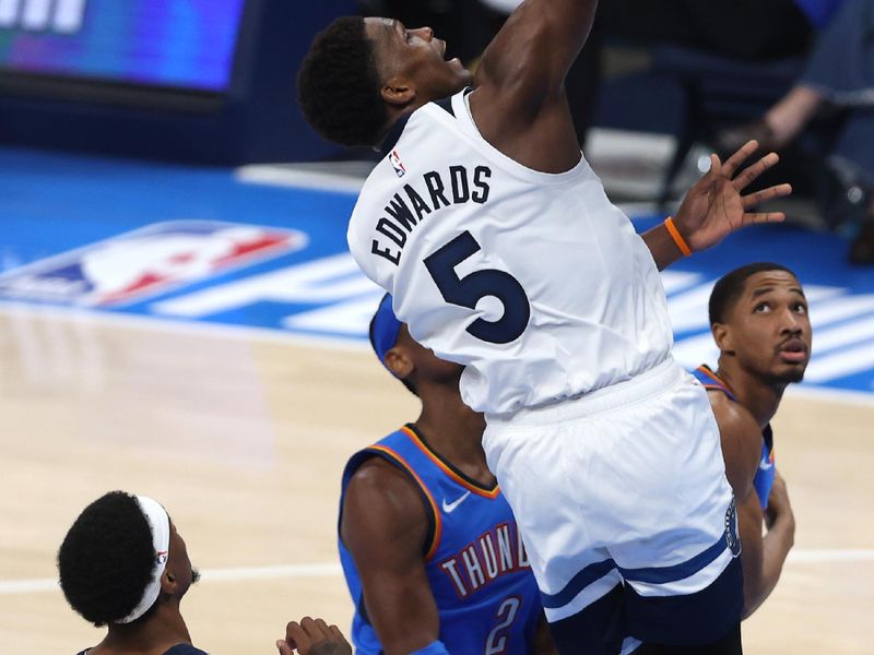 OKLAHOMA CITY, OKLAHOMA - MAY 22: Anthony Edwards #5 of the Minnesota Timberwolves shoots the ball against the Oklahoma City Thunder during the second quarter in Game Two of the Western Conference Finals of the 2025 NBA Playoffs at Paycom Center on May 22, 2025 in Oklahoma City, Oklahoma. NOTE TO USER: User expressly acknowledges and agrees that, by downloading and or using this photograph, User is consenting to the terms and conditions of the Getty Images License Agreement. (Photo by Matthew Stockman/Getty Images)