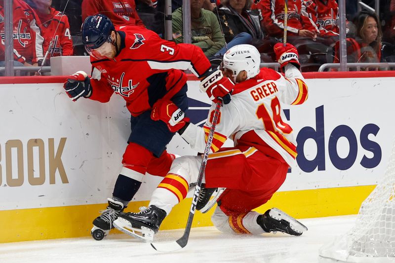 Oct 16, 2023; Washington, District of Columbia, USA; Washington Capitals defenseman Nick Jensen (3) and Calgary Flames left wing A.J. Greer (18) battle for the puck in the second period at Capital One Arena. Mandatory Credit: Geoff Burke-USA TODAY Sports