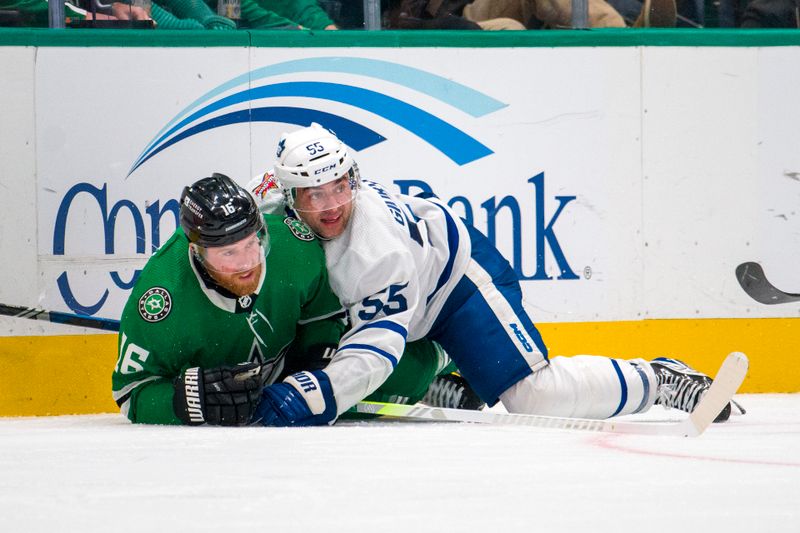 Oct 26, 2023; Dallas, Texas, USA; Toronto Maple Leafs defenseman Mark Giordano (55) checks Dallas Stars center Joe Pavelski (16) during the third period at the American Airlines Center. Mandatory Credit: Jerome Miron-USA TODAY Sports