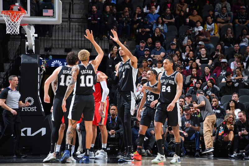 SAN ANTONIO, TX - FEBRUARY 2:  Victor Wembanyama #1 and Jeremy Sochan #10 of the San Antonio Spurs celebrate during the game again the New Orleans Pelicans on February 2, 2024 at the Frost Bank Center in San Antonio, Texas. NOTE TO USER: User expressly acknowledges and agrees that, by downloading and or using this photograph, user is consenting to the terms and conditions of the Getty Images License Agreement. Mandatory Copyright Notice: Copyright 2024 NBAE (Photos by Michael Gonzales/NBAE via Getty Images)